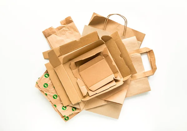 Heap of brown paper, prepared for recycling. Reduce, Reuse and Recycle concept. Flat lay — Stock Photo, Image