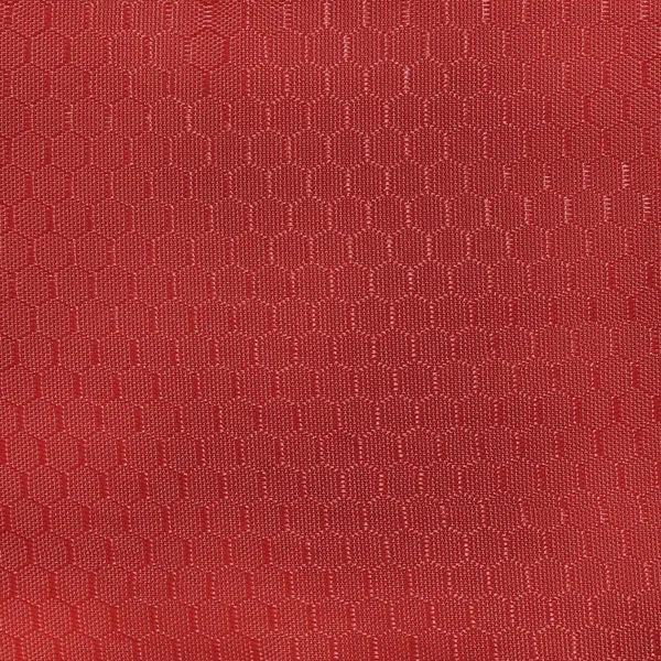 Stoff mit geometrischem Muster in Form von Honeycomb.texture oder Hintergrund — Stockfoto