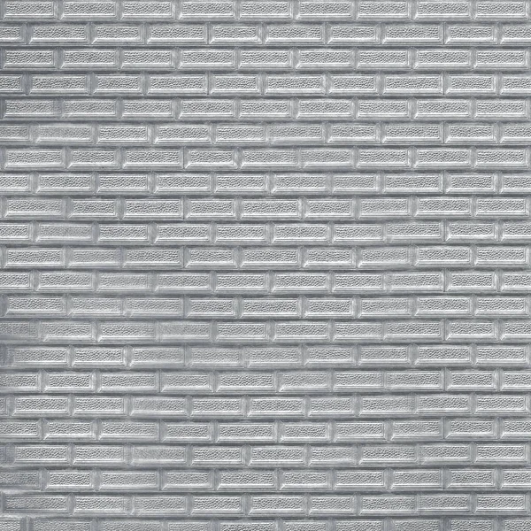 Papír s aplikovaným vzorem stříbrné barvy v podobě malých cihel — Stock fotografie