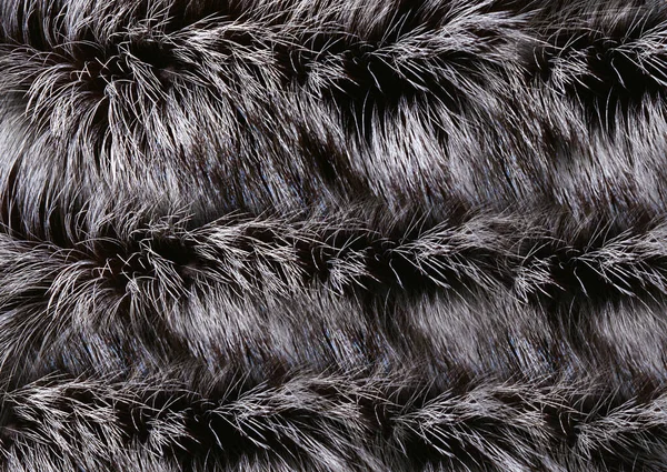 Długowłosy futro faux jest malowany w kolorze szarym i czarnym.Tekstura lub tło — Zdjęcie stockowe