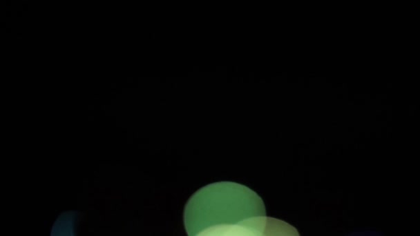 Flickande ofokuserade lampor på en svart bakgrund HD 1920x1080 — Stockvideo