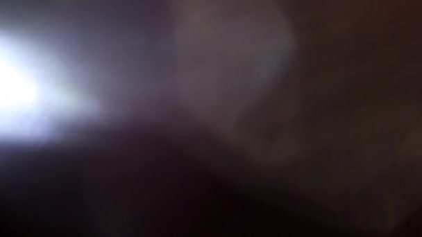 Parpadeo de luces desenfocadas en un fondo negro HD — Vídeos de Stock