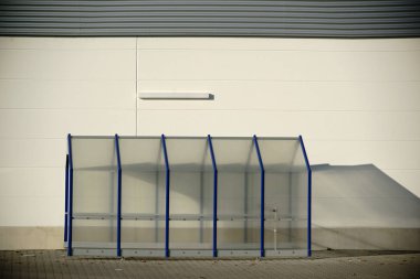 Plastic shelter for shopping baskets clipart