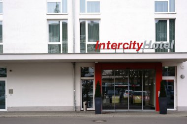 Intercity Hotel Darmstadt / The entrance of the Intercity Hotel at Darmstadt train station with a sliding glass door on December 02, 2017 in Darmstadt                            clipart
