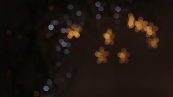 modèle clignotant d'un groupe de lumières floues et d'étoiles à cinq branches 