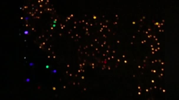 A group of blinking blurry lights of red, yellow, green and blue — Stock Video