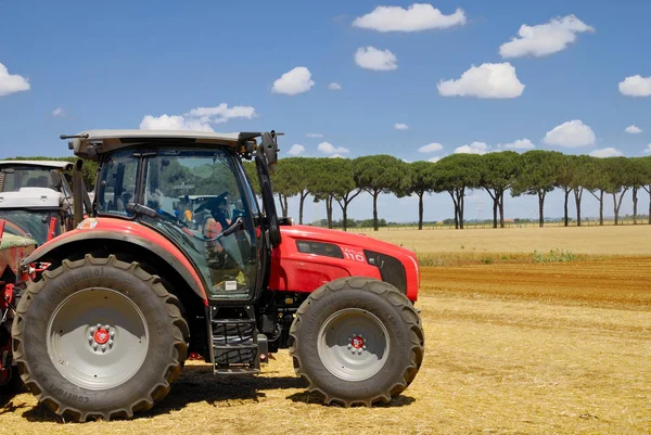 In an agricultural fair with free admission, a well-known italian brand presents its new range of tractors and agricultural machinery. June 23, 2013 in Central Italy.