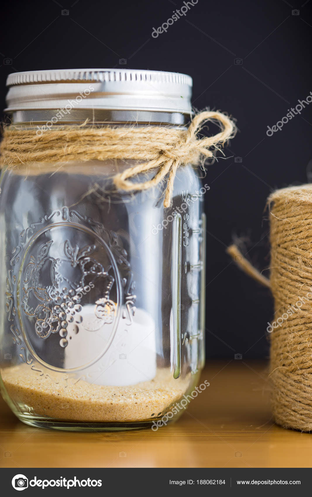 Decorative Glass Jar With Twine Spool Stock Photo