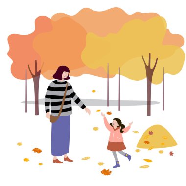 Kadın kızıyla parkta yürüyor, sonbahar yapraklarını kusuyor.