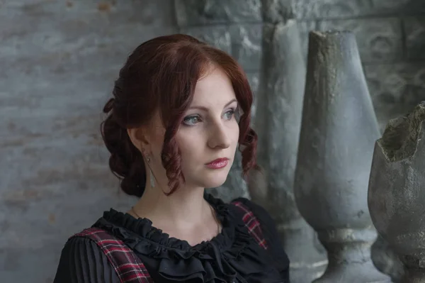 Beautiful young girl in a historical dress Stock Picture