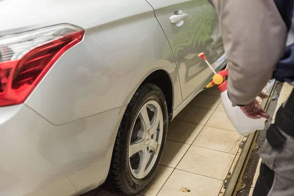 washing cars with pressurized water, washing with foam and water, car wash