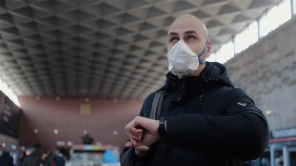 Young White Man Bald Head Wearing Respirator Stands Airport Fly — Stock Video