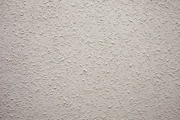 putty concrete wall, spray cement concrete finisher, Rough, The texture of the background, spontaneously imposed on the wall is cement plaster. Abstract background.