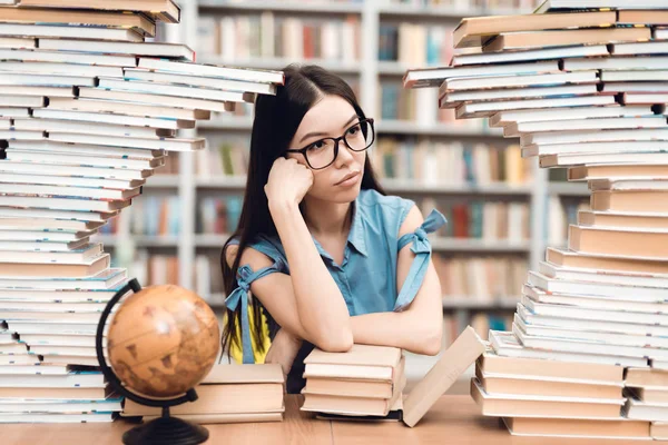 Ethnic Asian Girl Glasses Sitting Table Surrounded Books Library — Stock Photo, Image