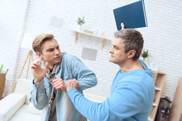 Father Intimidates Son Book Home — Stock Photo, Image