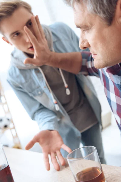 Father Sitting Table Glass Drinking While Son Trying Stop Him — Stock Photo, Image