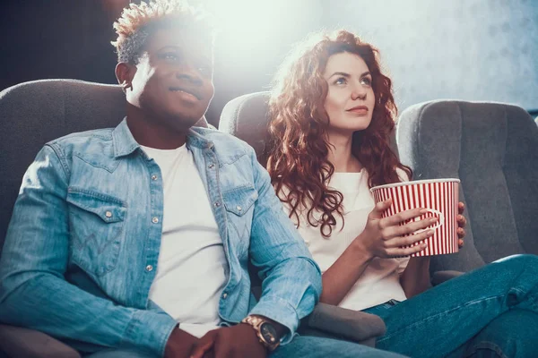 An African American man came with wife to cinema. — Stock Photo, Image