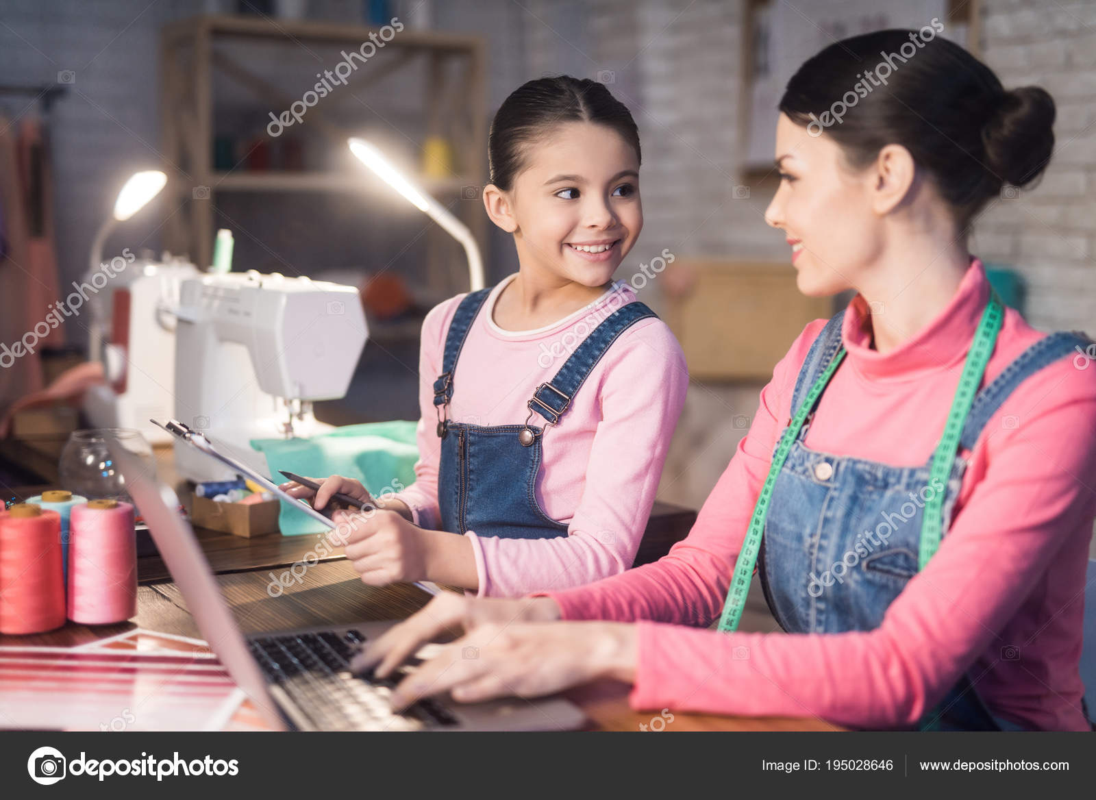 Mom Daughter Looking Piece Paper While Woman Sitting Computer Sewing — Stock Photo © Freeograph ...