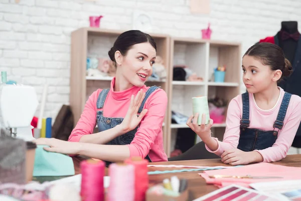 Little Girl Giving Woman Threads While Working Sewing Workshop — Stock Photo, Image