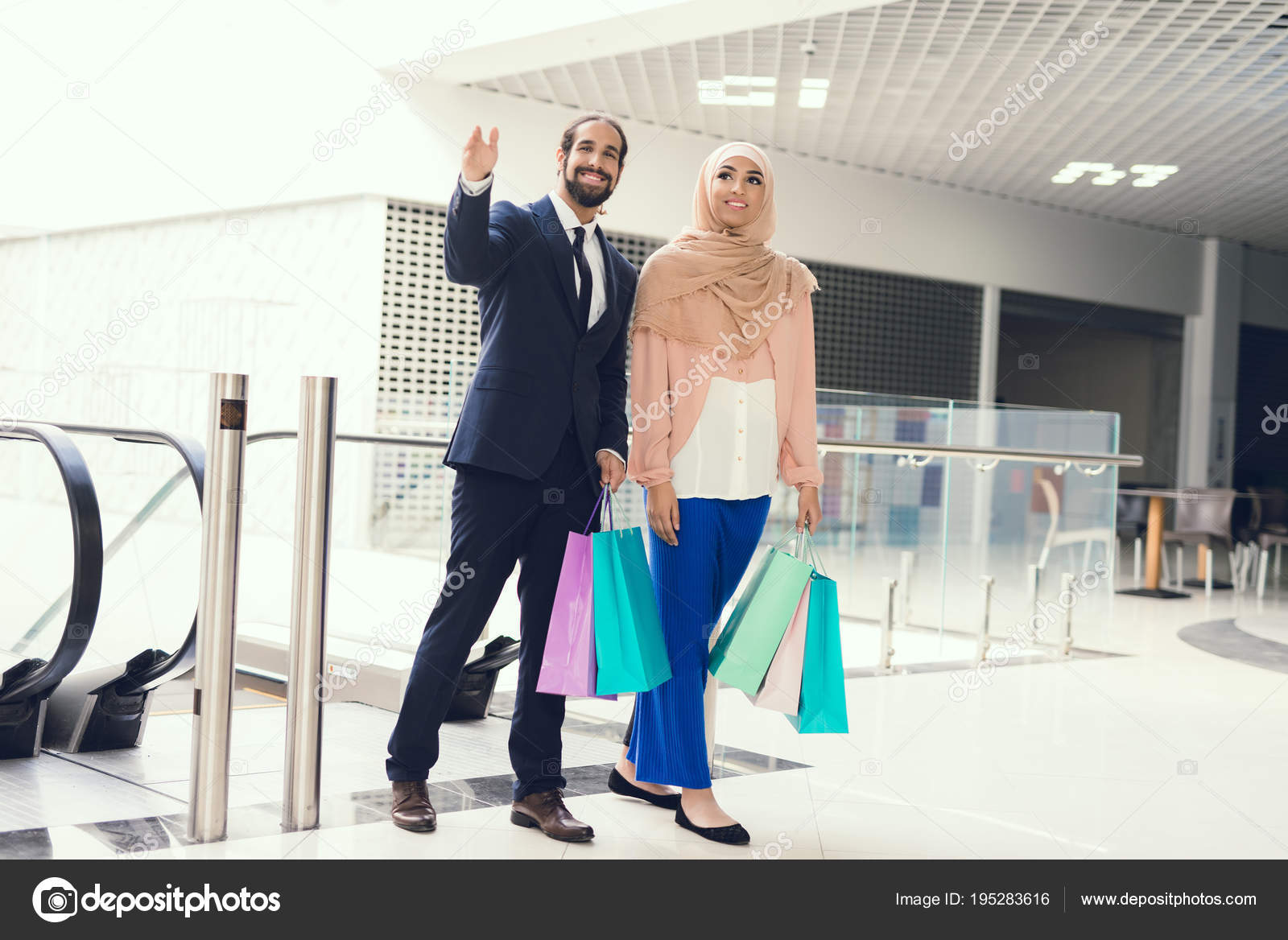 Arab Man Woman Walking Shopping Mall Stock Photo By C Freeograph 195283616