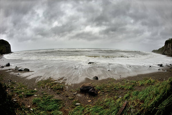 danger waves on the stormy shore