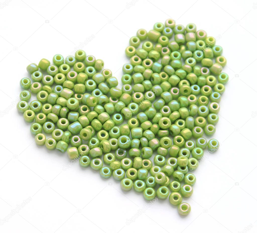 Heart made of green beeds