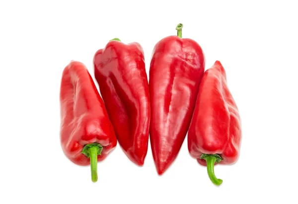 Flera söta röda Kapia paprika på en ljus bakgrund — Stockfoto