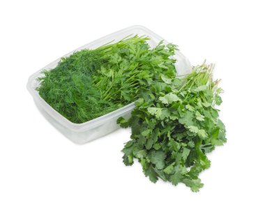 Dereotu, kişniş ve hafif bir arka plan üzerine maydanoz demetleri