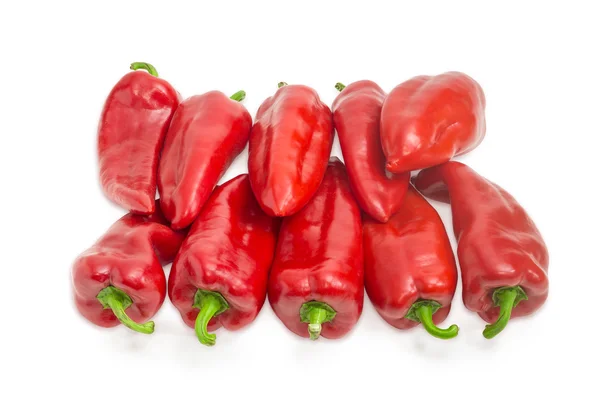 Pile of sweet red Kapia peppers on a light background — Stockfoto