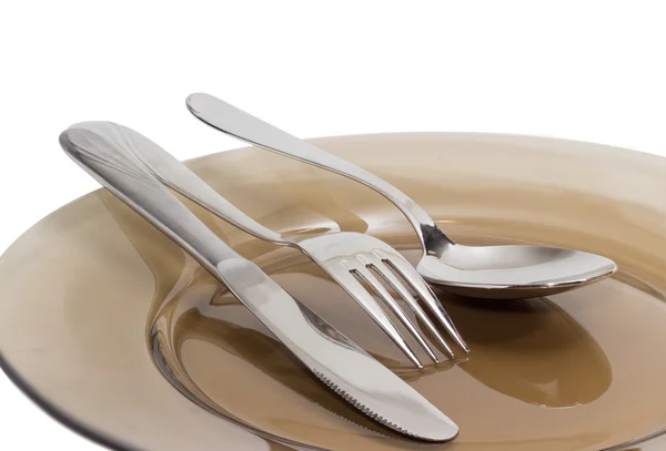 Conjunto de utensílios de comer em vidro prato closeup — Fotografia de Stock