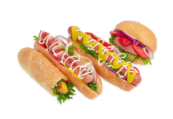 Diversi diversi hot dog con wurstel e verdure — Foto Stock