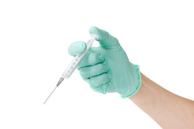 Tıbbi bir eldiven giymiş bir erkek elinde tıbbi şırınga  