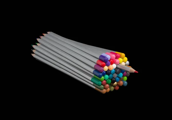 Mazzo di matite colorate con una matita in parte tirare fuori — Foto Stock