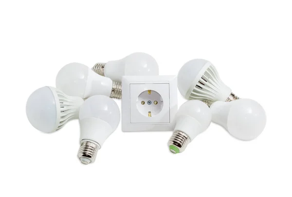 Verschillende licht emitterende diode lamp rond de wandcontactdoos — Stockfoto