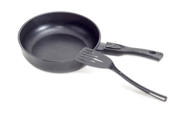 Frying pan with ceramic non-stick coating and plastic spatula — Stock Photo, Image