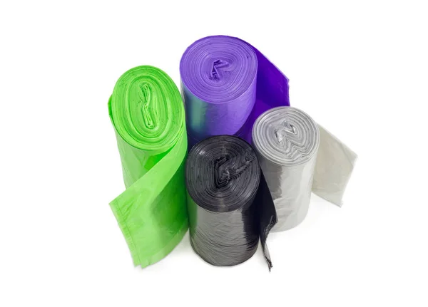 Plastic garbage bags in rolls of different sizes and colors — Stock Photo, Image