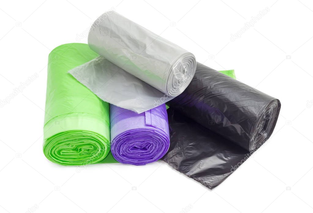 Plastic garbage bags in rolls of different sizes and colors