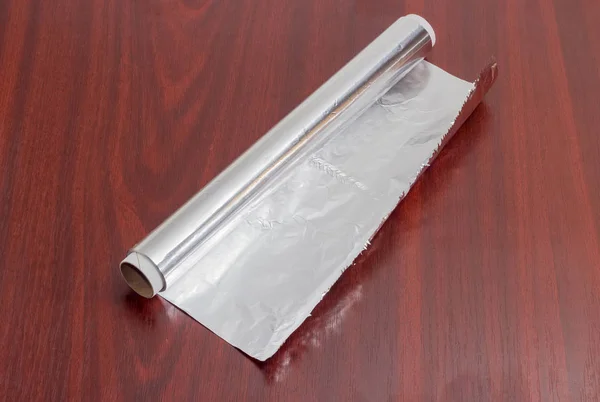 Roll of the aluminum foil for household use — Stock Photo, Image