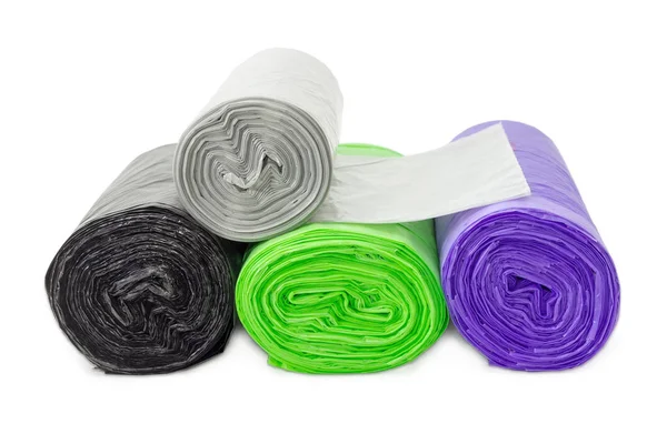 Garbage bags in rolls of different sizes and colors closeup — Stock Photo, Image