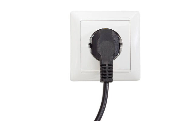 White socket outlet with connected corresponding power plug
