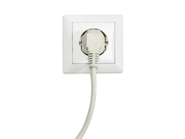 White socket outlet with connected corresponding power plug