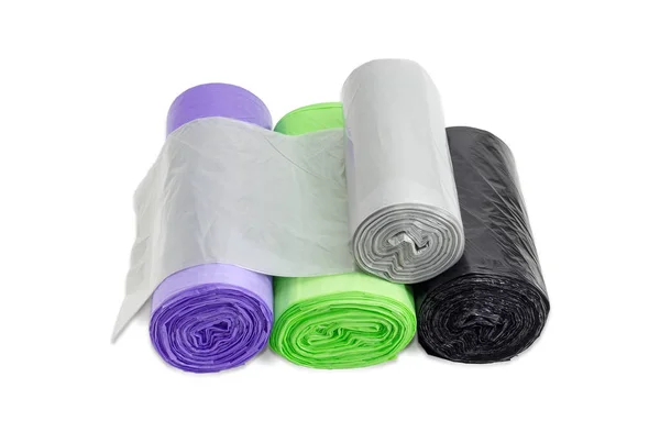 Plastic garbage bags in rolls of different sizes and colors — Stock Photo, Image