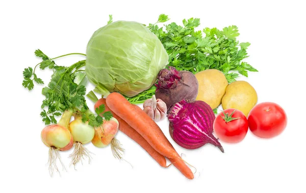 Stapel van verschillende groenten en potherb op een lichte achtergrond — Stockfoto