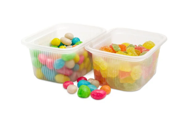 Caramelos y caramelos de azúcar varicolores hechos de pasas de uva vidriadas —  Fotos de Stock