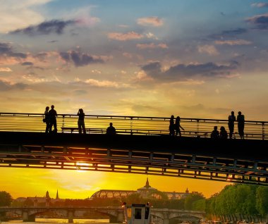 Bridges on the river Seine in Paris at sunset clipart
