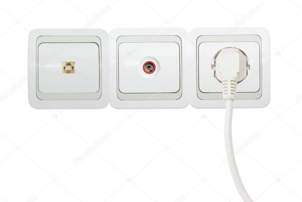 White domestic telephone socket, TV aerial socket and power socket