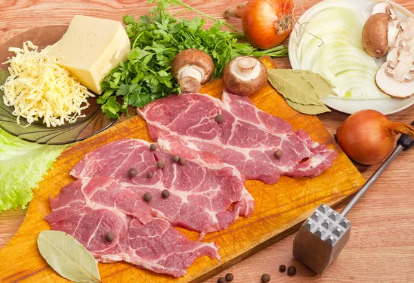 Ingredients for cooking pork chops baked with onion, mushrooms, cheese — Stock Photo, Image