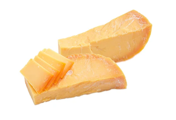 Two pieces and several slices of Dutch cheese — Stock Photo, Image
