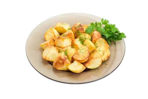 Smażone ziemniaki na ciemnym szklanym naczyniu — Zdjęcie stockowe