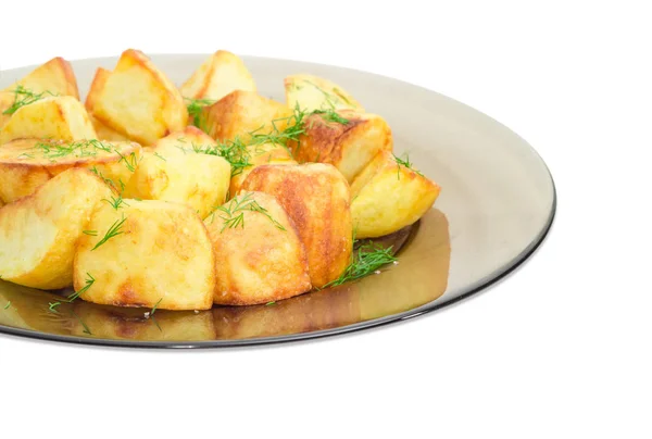 Papas fritas con eneldo en primer plano plato de vidrio oscuro — Foto de Stock